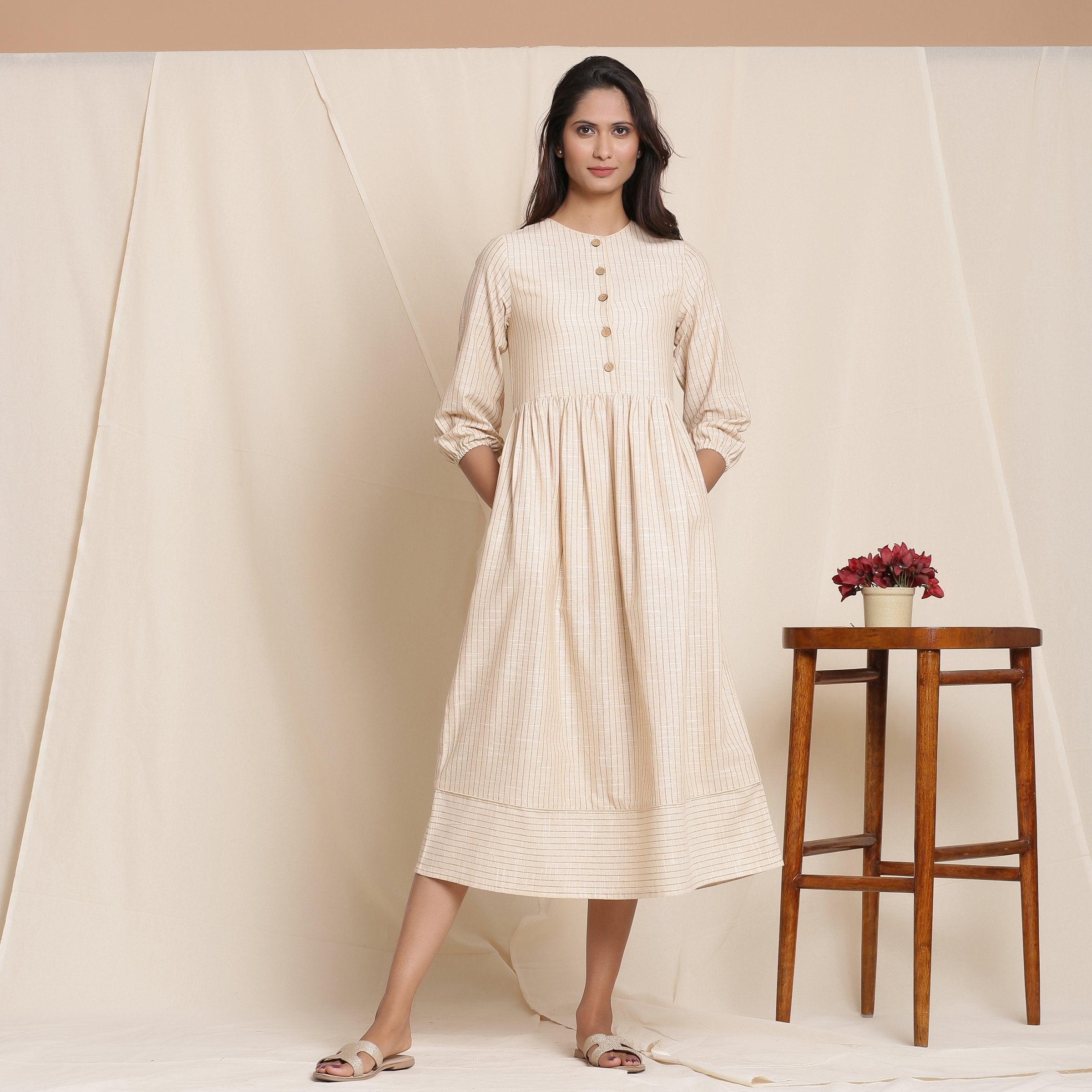 Front View of a Model wearing Warm Flannel Dusk Beige Gathered Dress