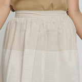 Front Detail of a Model wearing Striped Pleated High Rise Paneled Skirt