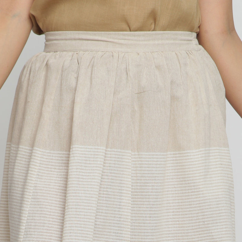 Front Detail of a Model wearing Striped Pleated High Rise Paneled Skirt