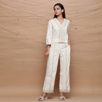 Front View of a Model wearing Handspun Jute Laced Top and Straight Pant Set