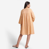 Back View of a Model wearing Light Yellow Yarn Dyed Cotton Yoked Dress