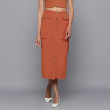 Front View of a Model wearing Sunset Rust Button-Down Midi Skirt