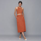 Front View of a Model wearing Sunset Rust Button-Down Midi Skirt