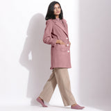 Right View of a Model wearing Mauve Cotton Corduroy Long Coat