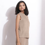 Right View of a Model wearing Taupe Beige Cotton Corduroy Funnel Neck Top