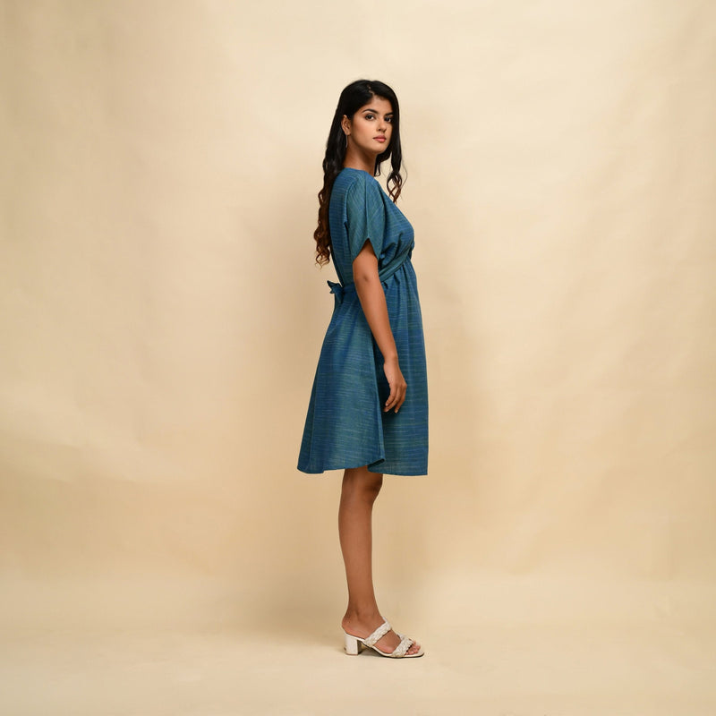Right View of a Model wearing Teal 100% Cotton Khadi Blouson Dress