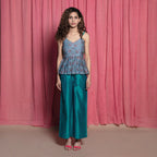 Front View of a Model wearing Teal Block Printed Chanderi Peplum Top