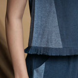 Right Detail of a Model wearing Teal Blue Panelled Short Top