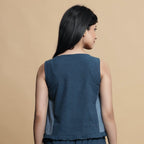 Back View of a Model wearing Teal Blue Panelled Short Top