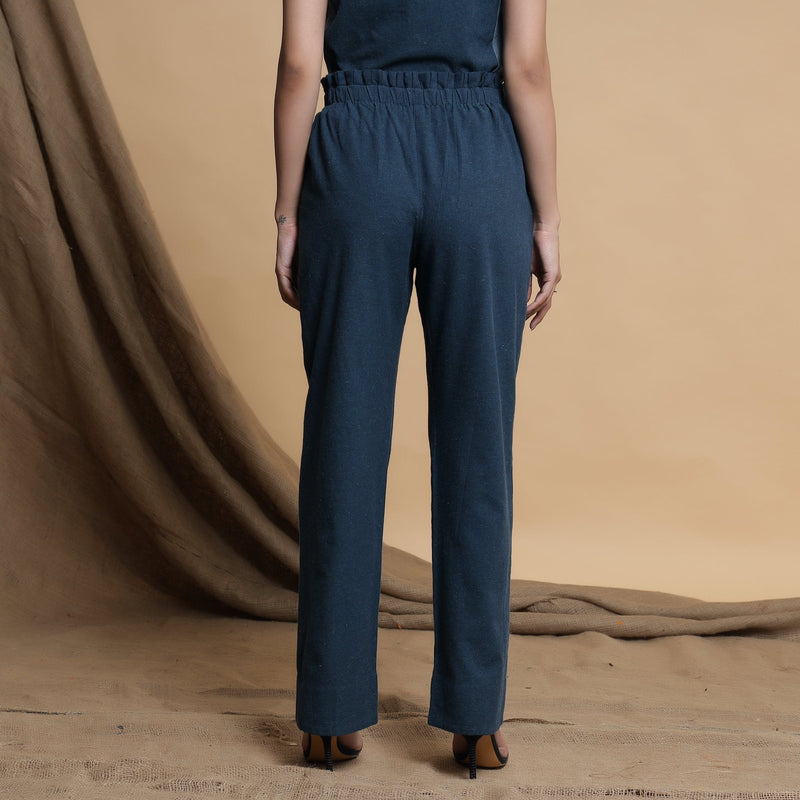 Back View of a Model wearing Teal Blue Side-Panelled Paperbag Pant