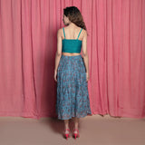 Back View of a Model wearing Teal Chanderi Block Printed Slit Skirt