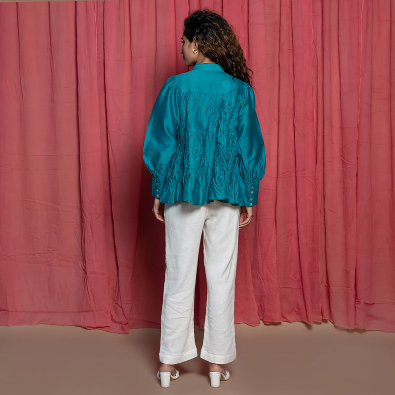 Back View of a Model wearing Teal Chanderi Button Down Tier Top