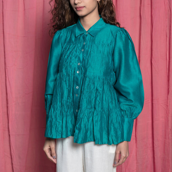Front Detail of a Model wearing Teal Chanderi Button Down Tier Top