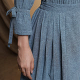 Front Detail of a Model wearing Turkish Blue Pleated Midi Skirt