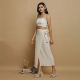 Left View of a Model wearing Undyed Banded Cotton Flax Wrap Skirt