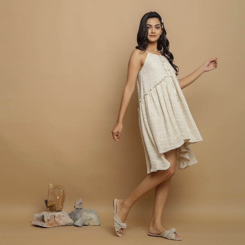 Right View of a Model wearing Undyed Cotton Flax Flared Dress