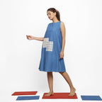 Left View of Model wearing Vegetable Dyed Blue Solid A-Line Dress