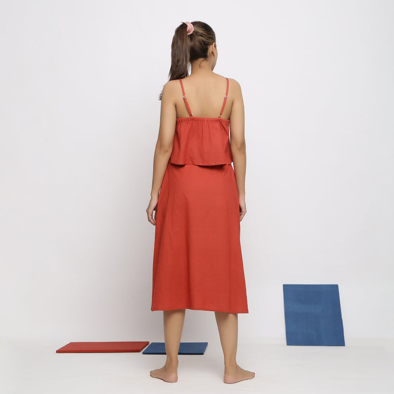 Back View of a Model wearing Vegetable Dyed Brick Red Button-Down Skirt