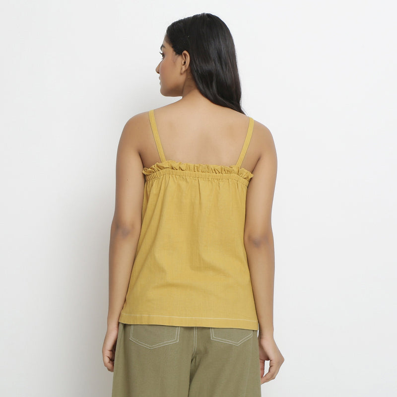 Back View of a Model wearing Vegetable Dyed Button-Down Camisole Top