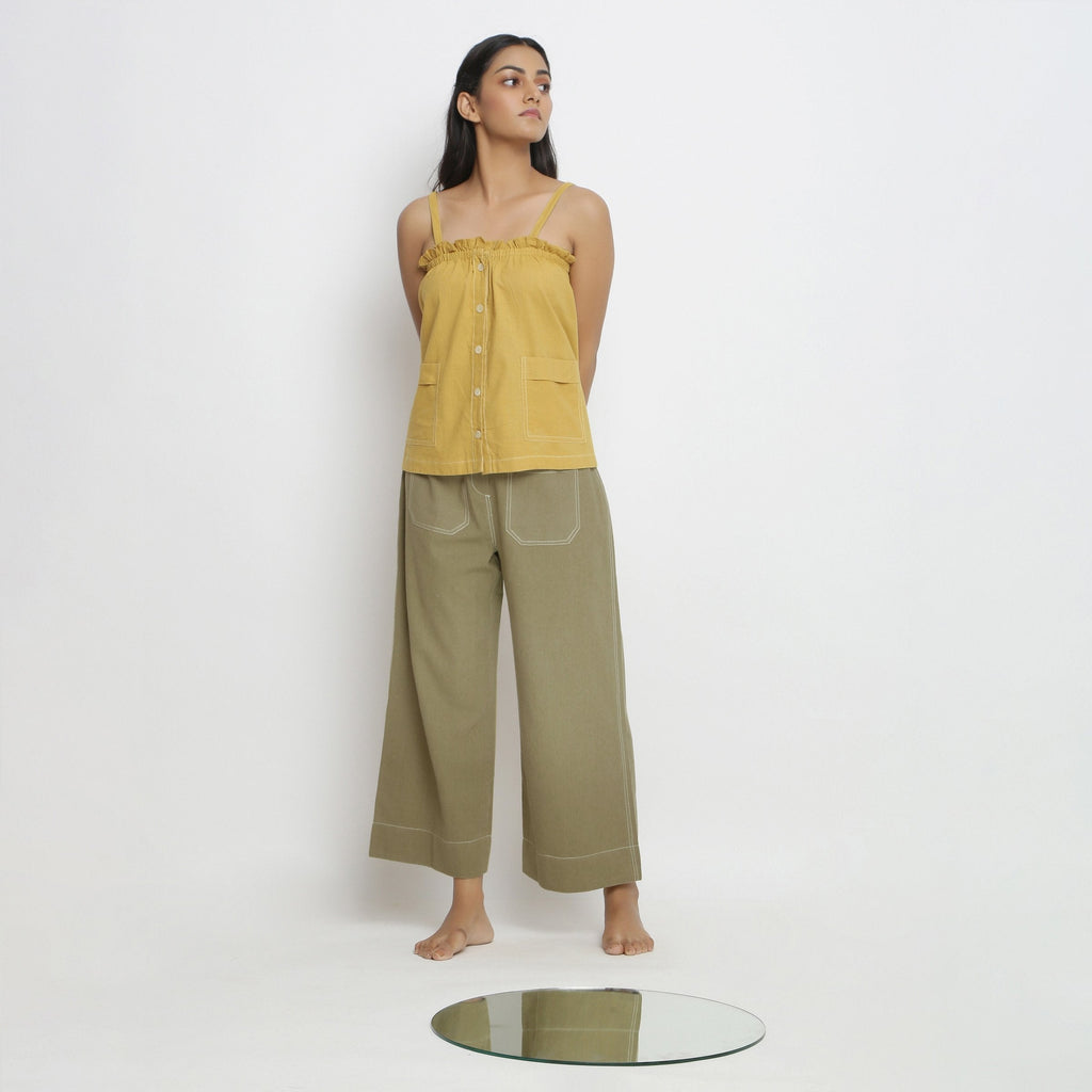 Front View of a Model wearing Vegetable Dyed Button-Down Camisole Top