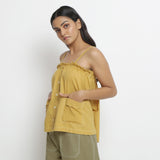 Left View of a Model wearing Vegetable Dyed Button-Down Camisole Top