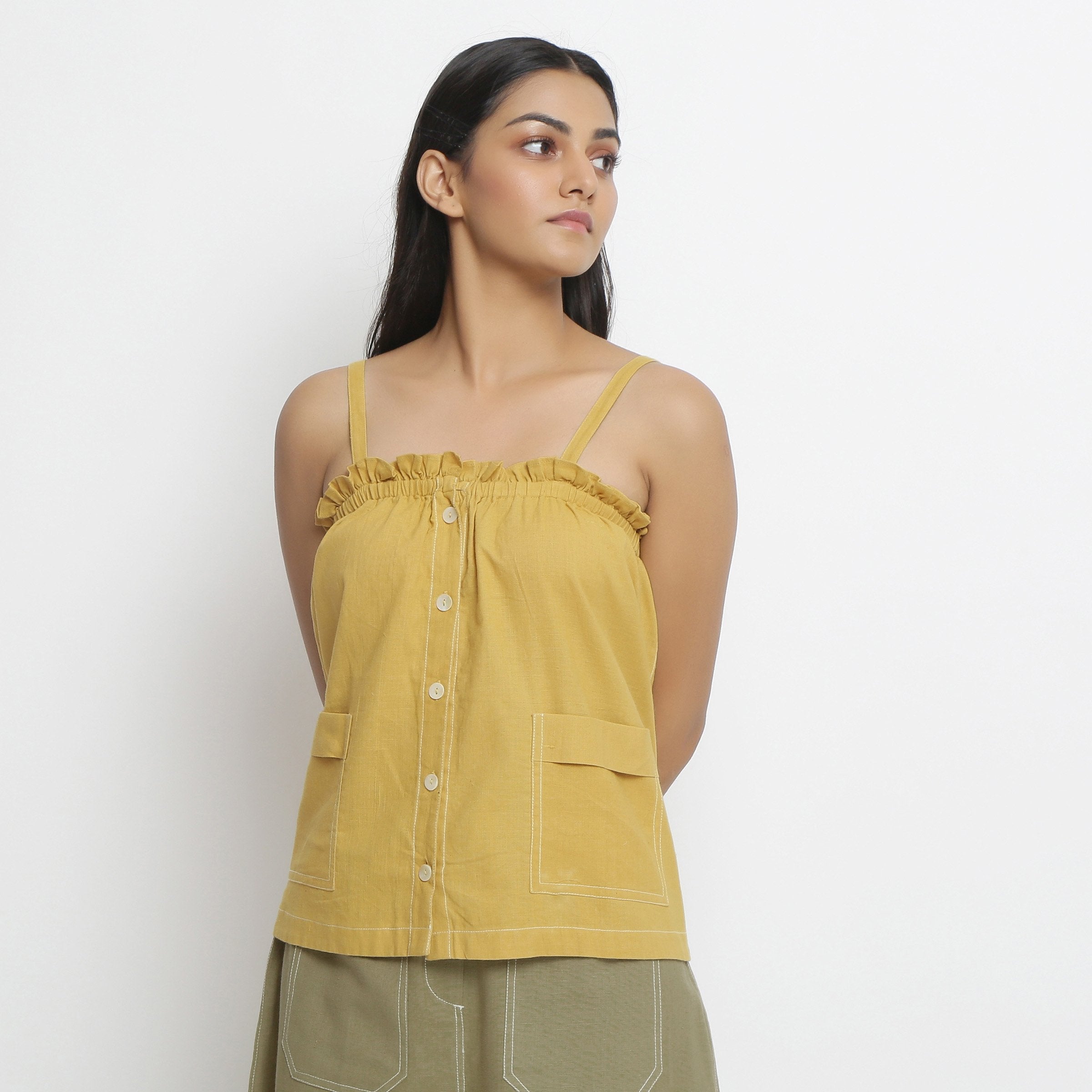 Front View of a Model wearing Vegetable Dyed Button-Down Camisole Top