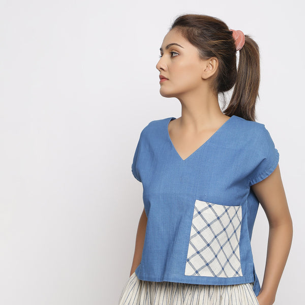 Front View of a Model wearing Vegetable Dyed Cotton Blue High Low Top