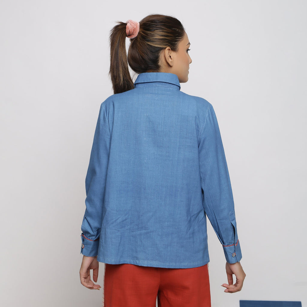 Back View of a Model wearing Vegetable Dyed Solid Button-Down Shirt