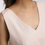 Front Detail of a Model wearing Vegetable Dyed Pink Deep Neck Top