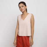 Front View of a Model wearing Vegetable Dyed Pink Deep Neck Top