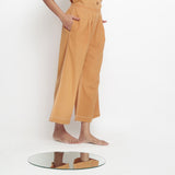 Right View of a Model wearing Vegetable Dyed Rustic Wide Legged Pant