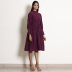 Right View of a Model wearing Warm Berry Wine Fit and Flare Dress