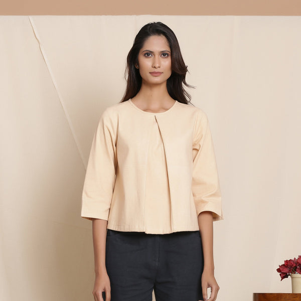 Front View of a Model wearing Warm Flannel Dusk Beige Box-Pleat Top