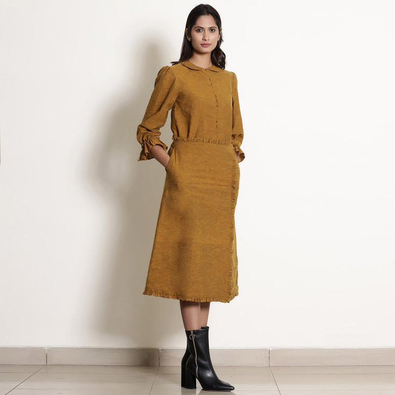 Right View of a Model wearing Warm Golden Oak A-Line Frilled Skirt