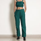 Front Detail of a Model wearing Warm Green Frilled Bustier Top and Pant Set
