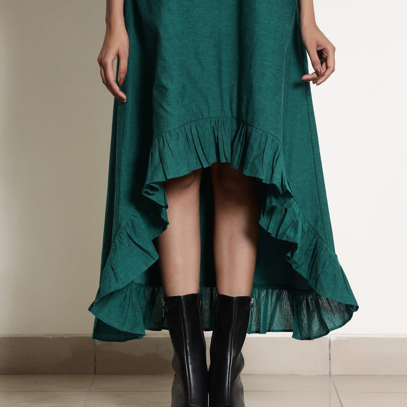 Front View of a Model wearing Warm Pine Green Frilled Neck High Low Dress