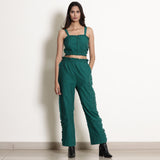 Front View of a Model wearing Warm Pine Green Frilled Straight Pant