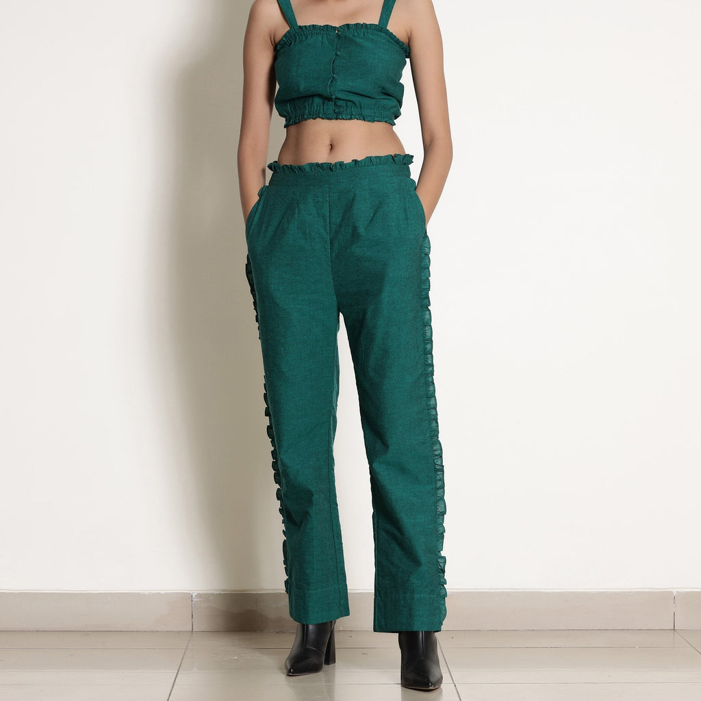 Front View of a Model wearing Warm Pine Green Frilled Straight Pant