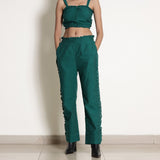 Front View of a Model wearing Warm Pine Green Frilled Straight Pant