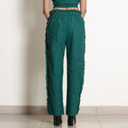 Back View of a Model wearing Warm Green Frilled Gathered Yoked Top