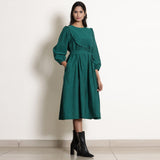 Front View of a Model wearing Warm Pine Green Frilled Yoke Dress