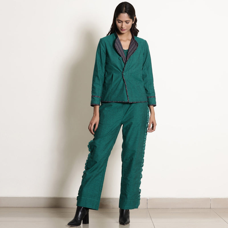 Front View of a Model wearing Pine Green Reversible Asymmetric Jacket