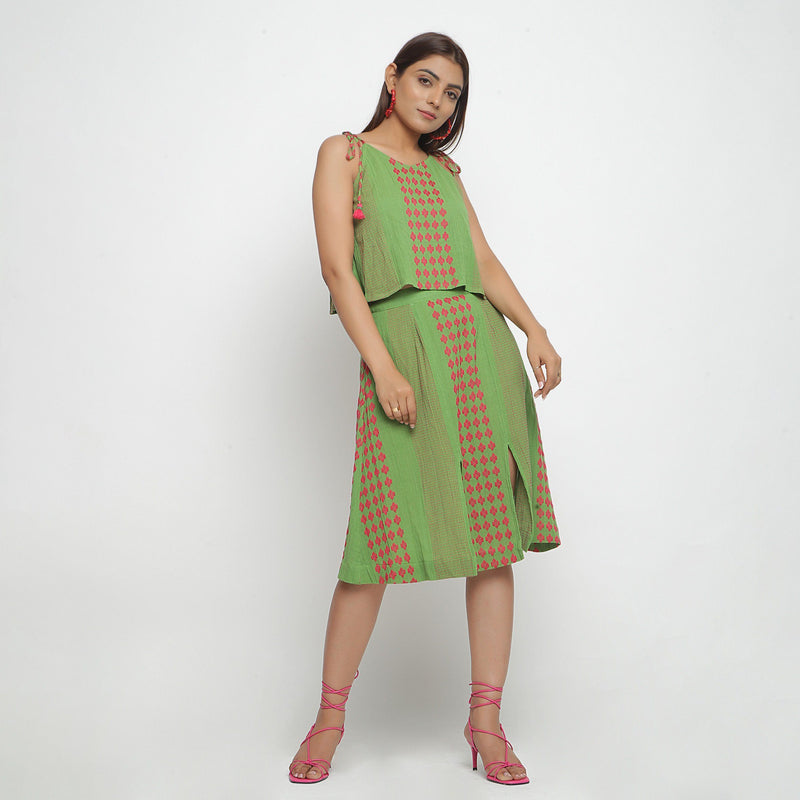 Front View of a Model wearing Green Crinkled Cotton Top and Skirt Set