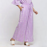 Right View of a Model wearing Lavender Tie Dye Wide Legged Palazzo Pant