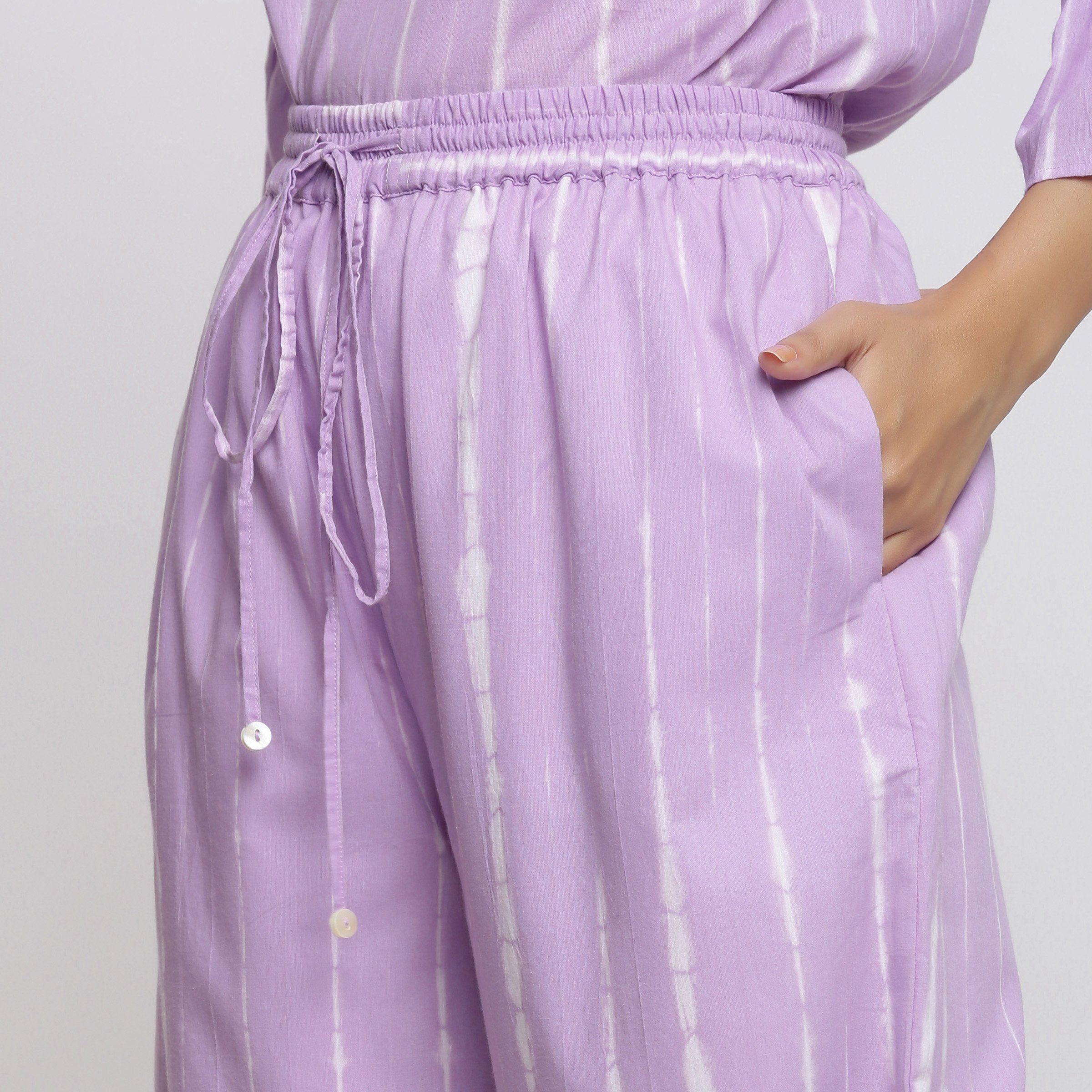 Left Detail of a Model wearing Lavender Tie Dye Wide Legged Palazzo Pant