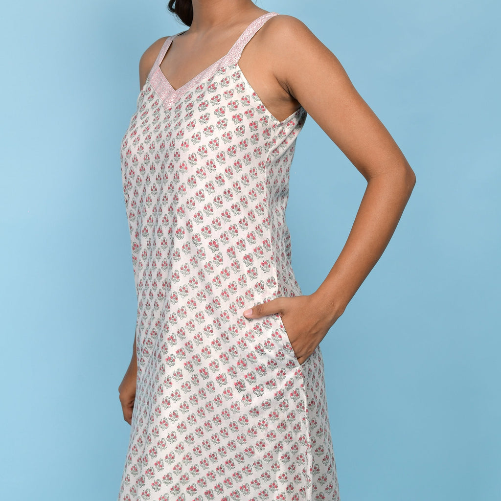 Front Detail of a Model wearing White Block Printed 100% Cotton High-Low Cami Dress