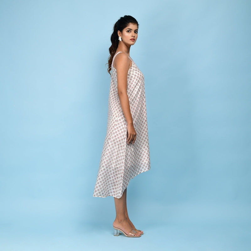 Right View of a Model wearing White Block Printed 100% Cotton High-Low Cami Dress