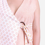 Front Detail of a Model wearing White Block Printed Lace Wrap Top