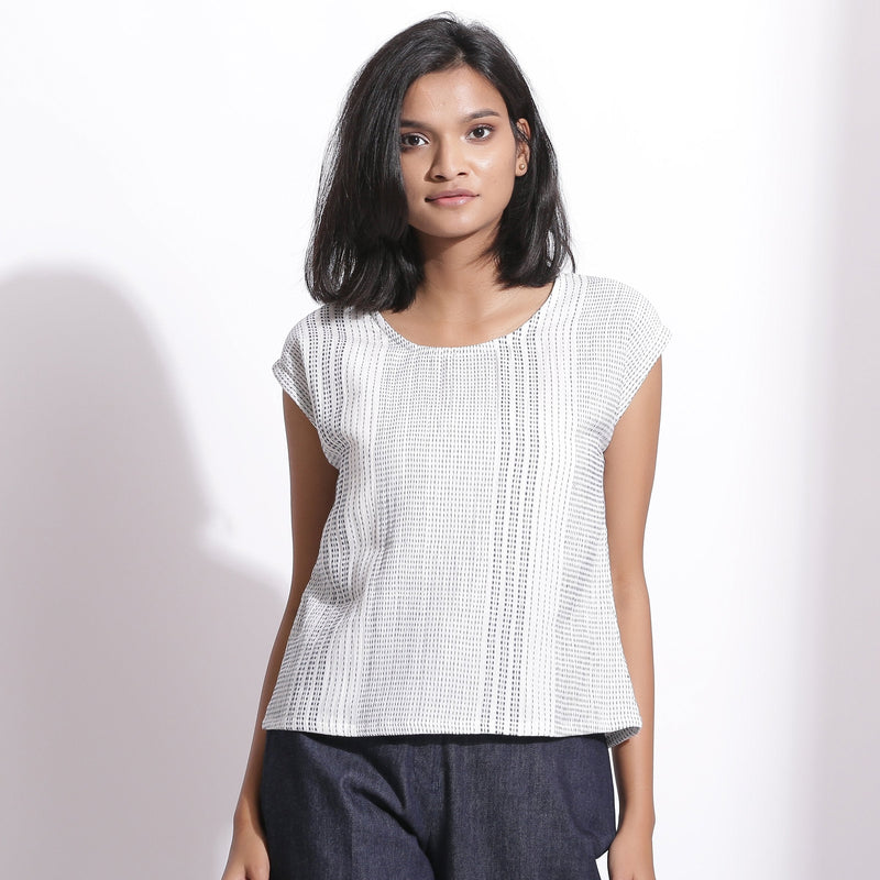 Front View of a Model wearing White Blue Striped Cotton Straight Top