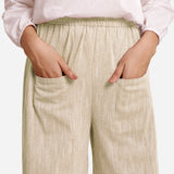 Front Detail of a Model wearing Beige Yarn Dyed Cotton Harem Pant